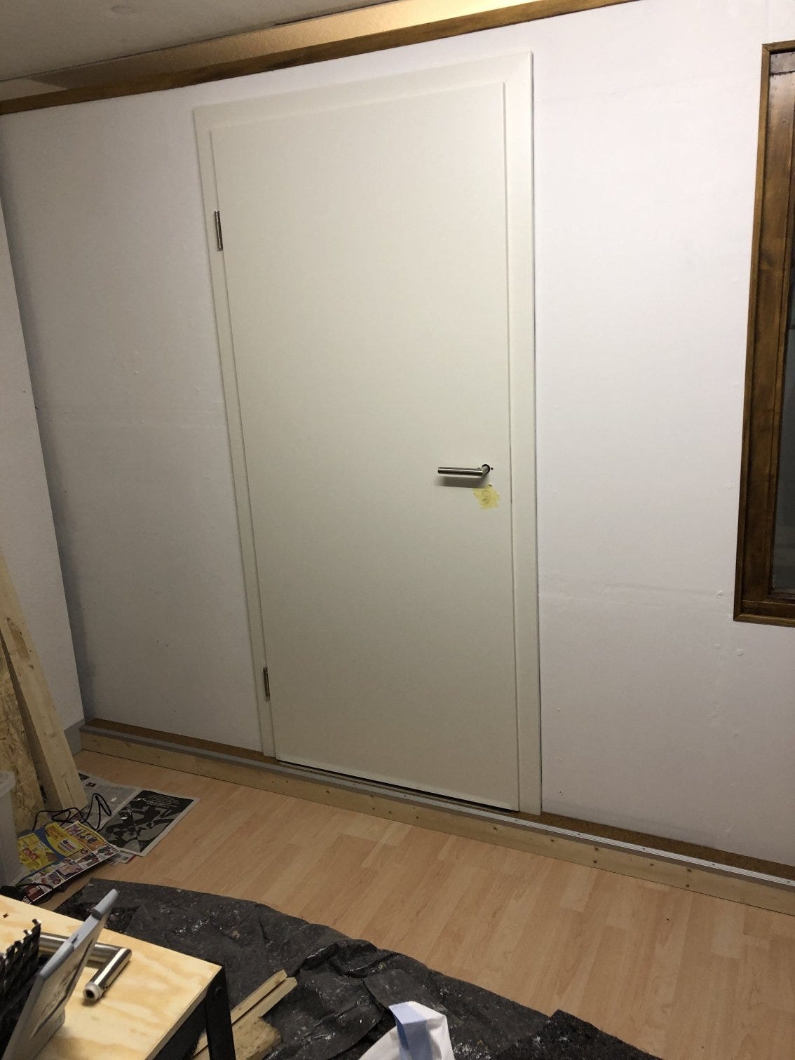 The fully installed door with handle
